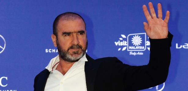 26032014---eric-cantona-ex-jogador-do-manchester-united-acena-para-os-fotografos-no-premio-laureus-1395849481130_615x300